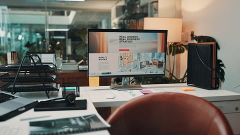 Professional workspace with computer and monitor