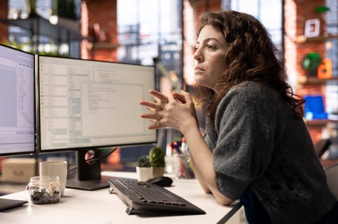 Professional web developer working on code